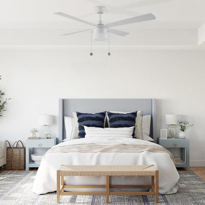 52-inch white ceiling fan with LED light and pull chain control 
 in elegant linen filled bedroom design 