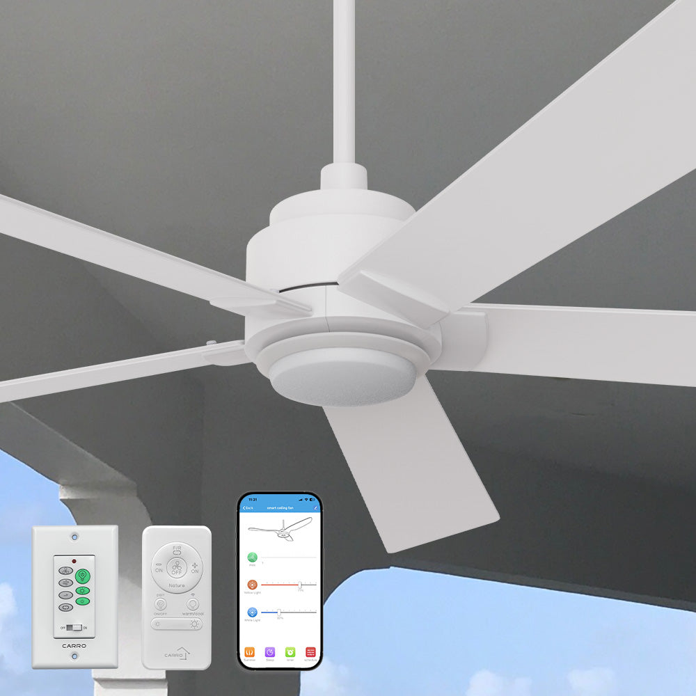 An image showcasing a Carro Aspen2 60-inch smart outdoor ceiling fan with LED light, mounted on a white ceiling for efficient airflow and cooling. The white ceiling fan features wooden blades and is paired with a remote control and a Carro white wall switch for smart operation with Alexa. A large window with a green outdoor view is visible in the background, indicating its suitability for outdoor or indoor settings. 