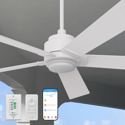 An image showcasing a Carro Aspen2 60-inch smart outdoor ceiling fan with LED light, mounted on a white ceiling for efficient airflow and cooling. The white ceiling fan features wooden blades and is paired with a remote control and a Carro white wall switch for smart operation with Alexa. A large window with a green outdoor view is visible in the background, indicating its suitability for outdoor or indoor settings. 