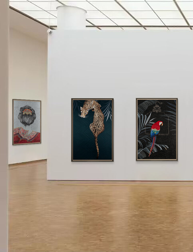 Three works of embroidery art in exhibition hall. There are three kinds of pattern in the hall, such as crane, leopard and ostrich 