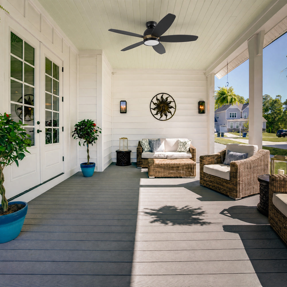 Smafan Carro Levi 48 inch outdoor ceiling Fan with light kit, black and gold design, flush mount, installed in a house balcony. 